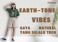 Model mengenakan outfit dengan palet earth-tone yang natural dan stylish