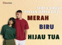 Model mengenakan outfit berani dengan warna bold merah, biru, dan hijau tua